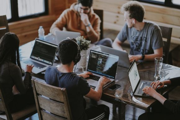 Start-up - group of people using laptop computer