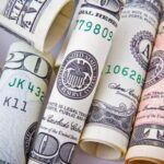 Start-up Finances - Rolled 20 U.s Dollar Bill