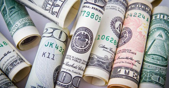 Start-up Finances - Rolled 20 U.s Dollar Bill